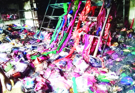 BARISHAL: A devastating fire gutted cloth godown at Vai Vai Super Market at Gournadi Upazila Bandar on Friday.