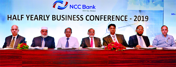 Mosleh Uddin Ahmed, Managing Director of NCC Bank, presiding over concluding ceremony of a two-day long 'Half Yearly Business Conference' at its corporate office in the city on Saturday. Md Nurun Newaz Salim, Chairman of the Bank, SM Abu Mohsin, Chairma