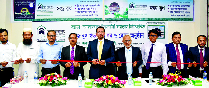 Farman R Chowdhury, Managing Director of Al-Arafah Islami Bank Ltd, inaugurating a 'Hajj Booth' to provide services of Hajj pilgrims at Ashkona Hajj Camp in the city recently. DMD Md Fazlul Karim, EVPs Md Mujibul Kader, Engr Md Idris Ali, SM Abu Jafar,