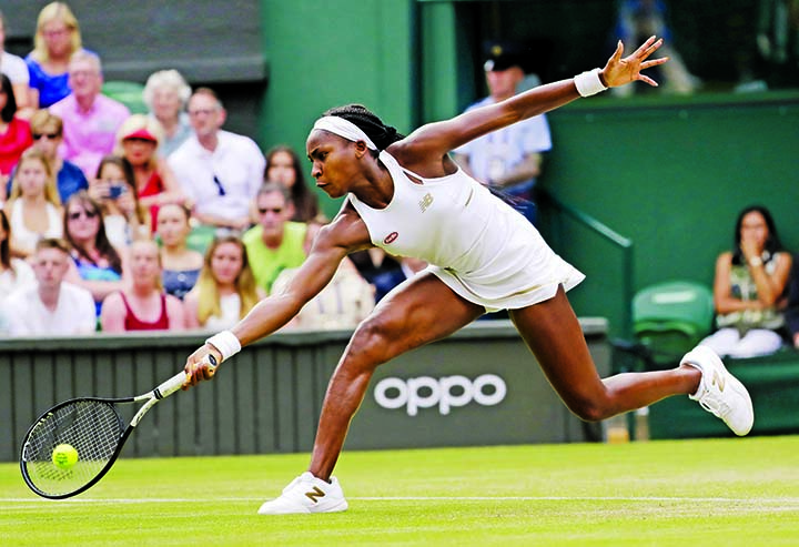 United States' Cori "Coco"" Gauff returns to Slovenia's Polona Hercog in a Women's singles match during day five of the Wimbledon Tennis Championships in London on Friday."