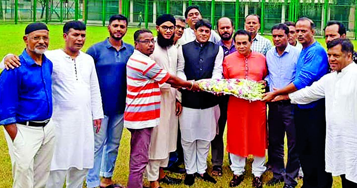 Officials of Orient Sporting Club receiving Hasibur Rahman Manik, Ward Councilor of Ward No 26 with bouquet on Saturday in the city's Lalbagh as he has been named the Chairman of the Cricket Committee of Orient Sporting Club for the year 2019-2020.