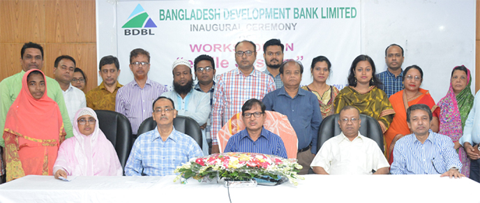 Md Abdul Baqui, General Manager (Admin) of Bangladesh Development Bank Ltd, inaugurating a day-long workshop on "e-File System" at its Karwan Bazar Training Institute in the city on Saturday. Paritosh Sarker, General Manager (IT & Risk Management) was a