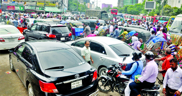 Hundreds of vehicles and rickshaws got stuck in city's Purana Paltan intersection area as Left Democratic Alliance brought out processions during half-day hartal protesting gas price hike on Sunday.