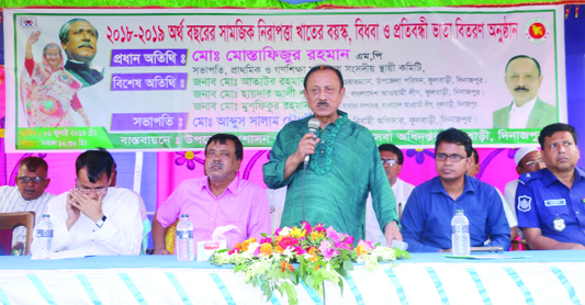DINAJPUR (South): Md Mustafizur Rahman Fizar, Chairman, Parliamentary Standing Committee of Primary and Mass Education speaking at old, widow and disabled allowance distribution programme jointly organised by Fulbari Upazila Administration and Socia
