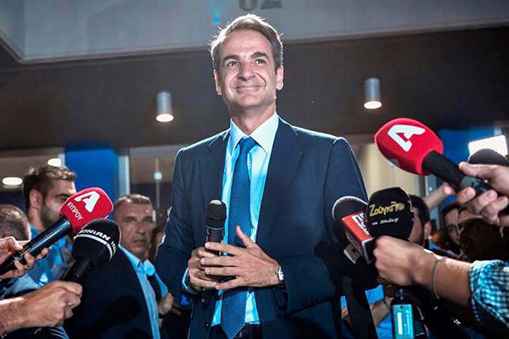 Greece's newly elected prime minister and leader of conservative New Democracy party Kyriakos Mitsotakis, speaks to the press outside the party's headquarters after the official results of the elections, in Athens on 8 July 2019.