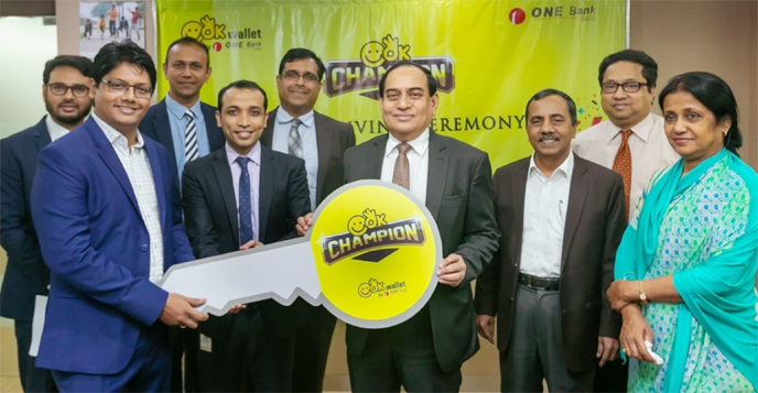 M Fakhrul Alam, Managing Director of ONE Bank Ltd, distributing awards among winners of OK Wallet Champion Campaign (150 CC Bike, iPhone XR, PS-4 and Diamond Rings) at the Bank's corporate office in the city recently. Wakar Hasan, Deputy Managing Directo