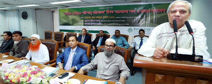 Prof Dr Nazmul Hassan, Chairman of Islami Bank Bangladesh Ltd, addressing a discussion on Shari`ah Compliance in Banking Operation at the Bank's corporate office in the city on Saturday. Moulana Mohiuddin Rabbani, member of Shari`ah Supervisory Committee