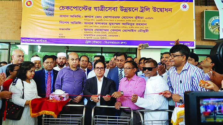 BENAPOLE: Mosharraf Hossain Bhuiyan , Chairman , National Board of Revenue Inaugurating passport passengers' trolley system and link road at Benapole International Check Post in Passenger Terminal recently.