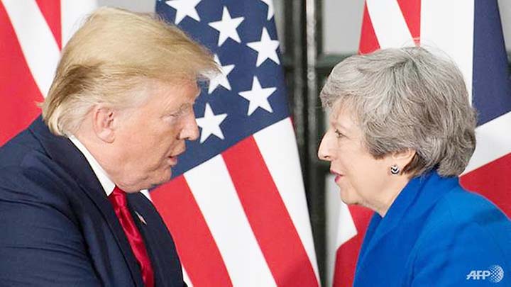 British Prime Minister Theresa May (right) putting on a brave face when hosting US President Donald Trump (left) for a state visit.