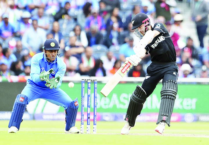 New Zealand's captain Kane Williamson (right) bats during the ICC World Cup Cricket semi-final match between India and New Zealand at Old Trafford in Manchester on Tuesday. Williamson hit a fine 67.