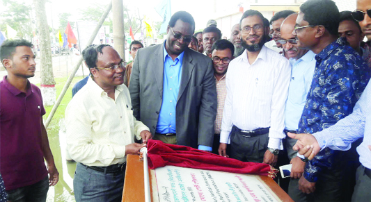 BAGERHAT: Kawabena Aman Kawah-Ayah, Senior Urban Specialist of World Bank laid the foundation stone of multipurpose building of Mongla Port Pourashava at Digraj in Mongla Upazila as Chief Guest on Tuesday .