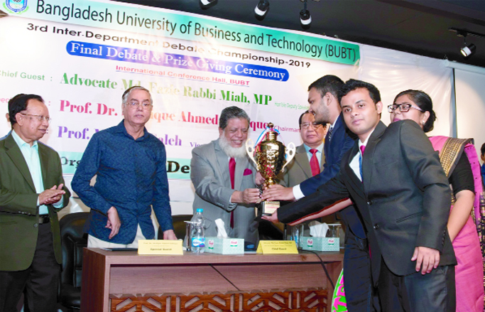 Deputy Speaker of the Parliament Md. Fazle Rabbi Mia, MP distributes trophies among the winners of three day debate competition organized by Bangladesh University of Business and Technology at the International Conference Hall, Rupnagar in the capital on