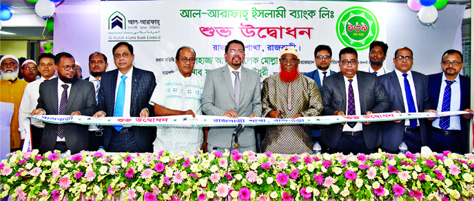 Abdul Malek Molla, Director of Al-Arafah Islami Bank Ltd, inaugurating its 169th branch at Rajbari on Thursday. Managing Director and CEO Farman R Chowdhury, Executive Vice President and Head of AIBL Khulna Zone Md. Manjur Hasan and CFO Muhammed Nadim, Ex