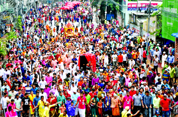 A procession of Return Ratha Yatra, a religious festival of the Hindu community was brought out in the city. The snap was taken from Hatkhola Road on Friday.