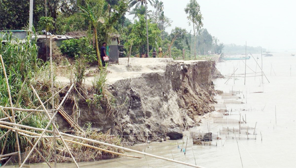 Incessant rain makes river erosion in Shibaloy, Manikganj. The snap was taken on Friday.