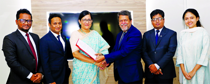 Farah Kabir, Executive Director of ActionAid International Bangladesh (AAIB) and Azam Khan, Group Chief Communications Officer of Mutual Trust Bank Ltd (MTB), exchanging an agreement signing document at ActionAid's head office in the city recently. As pe