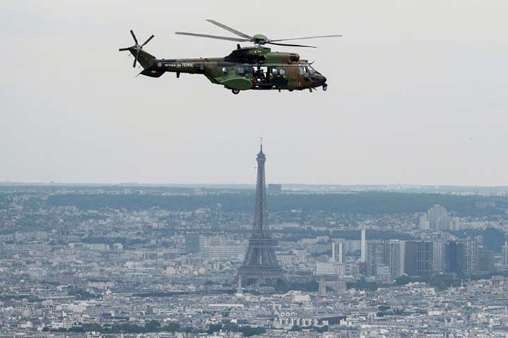 A French Eurocopter AS 532 Cougar flying during a rehearsal ahead of the Bastille day military air parade. AFP photo