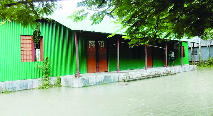 JAMALPUR: Kolkihara Community School at Bakshiganj Upazila has been water-logged as flood situation further deteriorates in Jamalpur. This snap was taken yesterday. Photo: Ms Shah Alam
