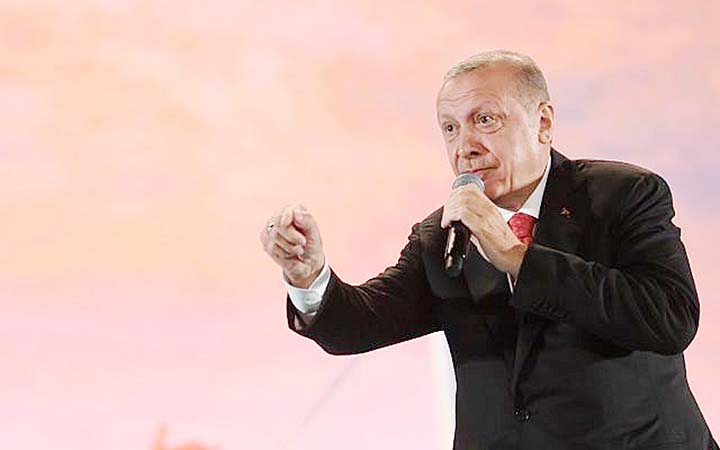 Turkish President Recep Tayyip Erdogan speaks during a rally to commemorate an attempted coup, at the Ataturk International Airport in Istanbul on Monday.