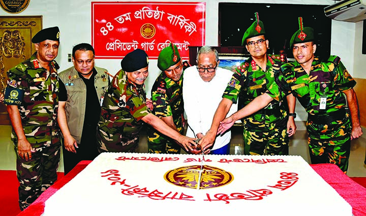 President Abdul Hamid along with high officials of President Guard Regiment (PGR) cutting cake marking the 44th founding anniversary of PGR at its Headquarters in Dhaka Cantonment on Tuesday. ISPR photo