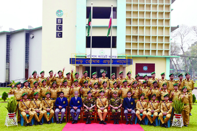 BARISHAL: Students and teachers of Barishal Cadet College under Barishal Education Board showing V-sign as the college scored cent percent pass with GPA-5 in HSC result published yesterday.