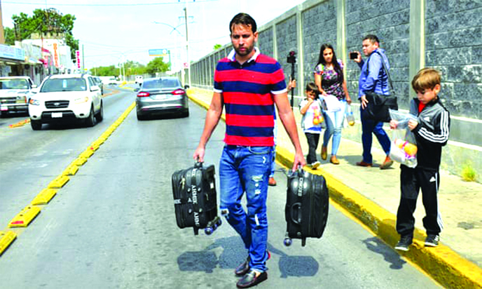 The Ascencio family from Venezuela are returned by US authorities to Nuevo Laredo, Mexico as part of the so-called Remain in Mexico programme for asylum seekers this month.