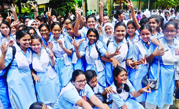 Teachers and students of the city's Viqarunnisa Noon School and College rejoicing on the brilliant results of HSC examination. The snap was taken from the premises of the institution on Wednesday.