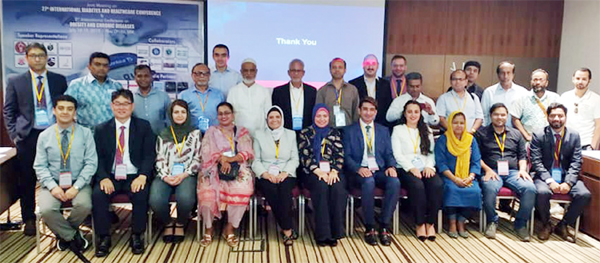 Medical Officer of the National Institute of Heart Diseases, Dhaka Dr Faisal Ahmed Bhuiyan Tuhin poses for a photo session with the participants of an international seminar at Radisson Blu Inn Hotel in Arab Emirate after presenting a paper in the seminar