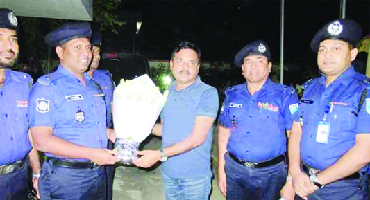 RAJBARI: Newly-appointed Police Super of Rajbari, Mizanur Rahman being greeted by Additional Police Super Md Salahuddin and other police officials on Wednesday.