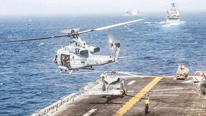 A U.S. Marines helicopter takes off from the flight deck of the USS Boxer during its transit through Strait of Hormuz.