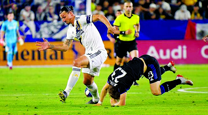 Zlatan Ibrahimovic (left) of LA Galaxy in action against Los Angeles FC in their Major League Soccer at Carson, Calif on Friday.
