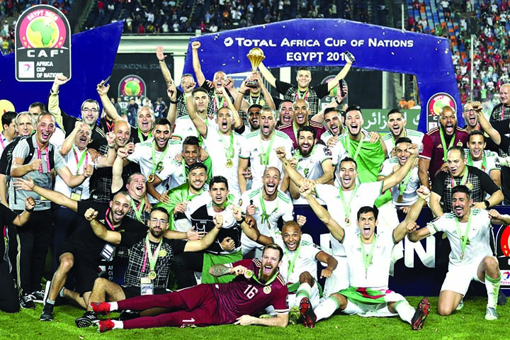 Algerian players celebrate after winning the Africa Cup of Nations at Cairo International stadium in Cairo, Egypt on Friday.