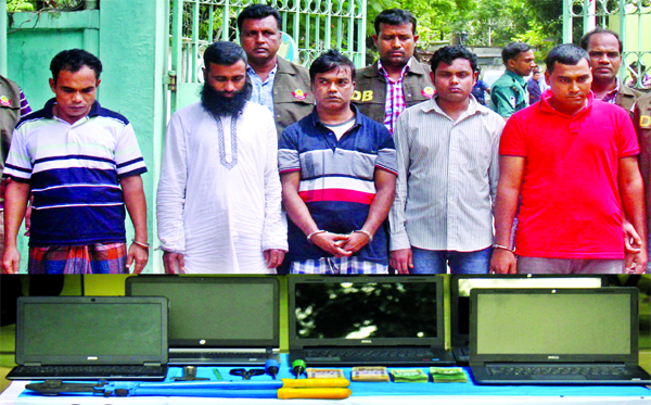 Five alleged criminals were arrested by DB police with five laptops, two private cars and Tk 1,90,000 in cash from city's Bangshal area. This photo was taken from in front of DB office on Monday.