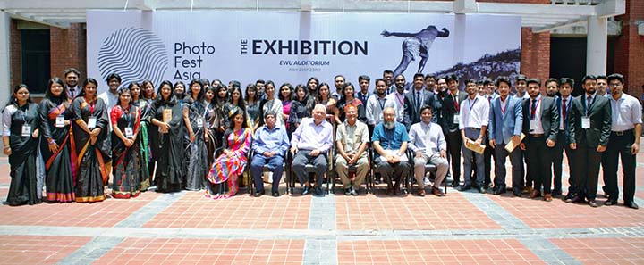 Syed Manzur Elahi, Chairperson, Board of Trustees of East West University along with other guests is seen at a photo pose at the inaugural session of a photo exhibition held at the University campus recently.