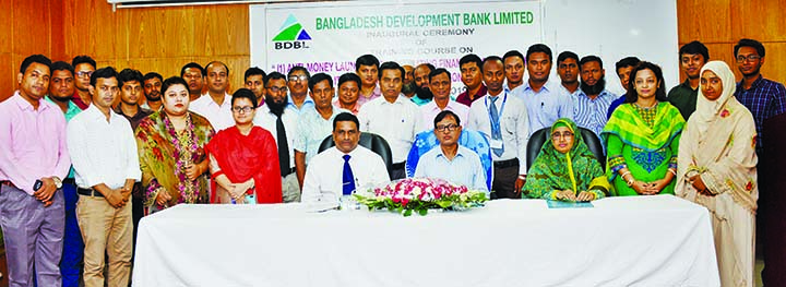 Bangladesh Development Bank Ltd General Manager (Admin) Md Abdul Baqui and Head of Training Institute Rubina Yeasmin Khan along with participants pose after attending a four-day long training course on "Anti-Money Laundering & Combating Financing of Terr"