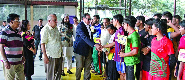 Secretary General of Bangladesh Olympic Association Syed Shahed Reza being introduced with the participants of the RDDL National Junior (Boys' & Girls') Wrestling Competition at the Shaheed (Captain) M Mansur Ali National Handball Competition on Tuesday