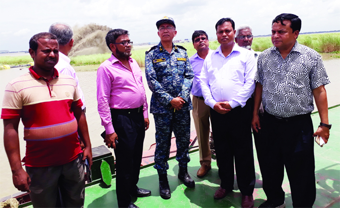 MUNSHIGANJ: Commodore M Mahbub-ul Islam, Chairman, BIWTA visiting Simulia- Kathalbari Ferry Ghat area to check the navigation problem on Tuesday. Among others, Saidul Rahman, Deputy Chief Engineer of BIWTA was present there.