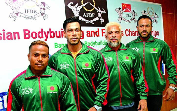 (From left to right) The four bodybuilders of Bangladesh are: Ronjit Chandra Sarkar, Ruslan Mohammad Hossain, M Rafiqul Islam, Anwar Hossain pose for a photo session on Wednesday before leaving the city for China to take part in the Asian Bodybuilding & F