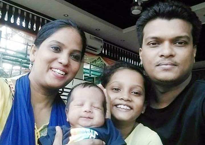 Kid Musa of the city's Manipuripara along with his parents. Musa of only 34 days died of dengue on Saturday last keeping his parents and other relatives in deep condolence.