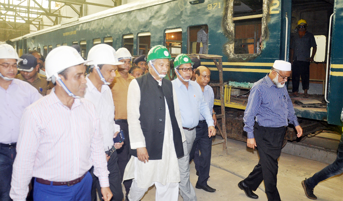 Railway Minister Nurul Islam Sujon MP visiting activities of Pahartoli Railway Workshop yesterday.