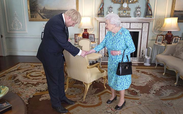 Boris Johnson meeting the Queen at Buckingham Palace.