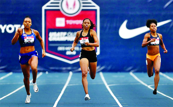 Allyson Felix (centre) competes in the Women's 400 Meter heats during the 2019 USATF Outdoor Championships at Drake Stadium in Des Moines, Iowa on Thursday.