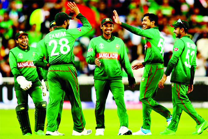 Soumya Sarkar (2nd from right) of Bangladesh, celebrates with his teammates after dismissal of Kusal Perera during the first One Day International (ODI) match between Bangladesh and Sri Lanka at R Premadasa Stadium in Colombo on Friday.