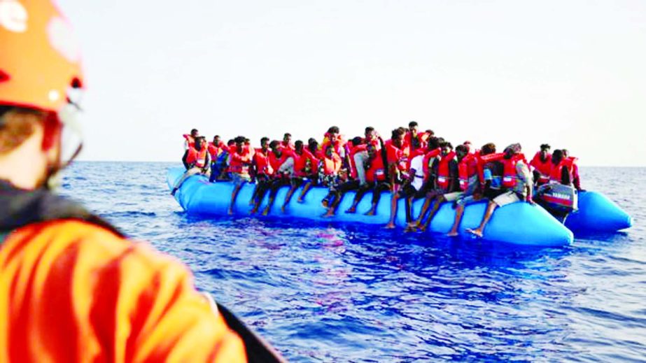 Migrants often make the perilous journey from Libya to Europe in overcrowded boats, like this one pictured in early July.