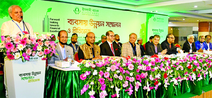 Prof Md Nazmul Hassan, Chairman of Islami Bank Bangladesh Ltd, addressing the bank's Business Development Conference at a convention center in the city on Saturday. EC Chairman Prof Dr Md Salim Uddin, Directors Prof Dr Qazi Shahidul Alam, Md Joynal Abedi