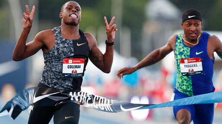 Christian Coleman celebrates in front of Michael Rodgers (right) as he wins the men's 100-meter dash final at the U.S. Championships athletic meet in Des Moines, Iowa on Friday.