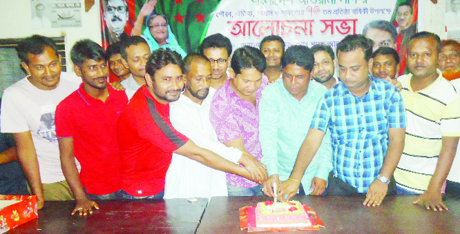 BANARIPARA(Barishal): Nurul Huda Talukder, Chairman, Upazila Parishad and Raht Sumna, President, Banaripara Press Club cutting cake on the occasion of the founding anniversary of Swechchhasebak League on Saturday.