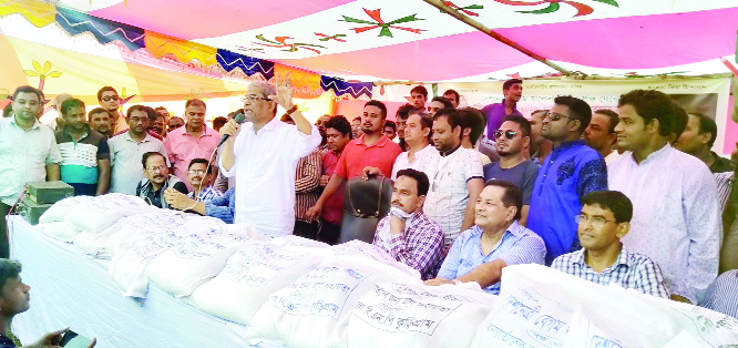 KURIGRAM: BNP Secretary General Mirza Fakhrul Islam Alamgir distributed relief goods among the flood-hit people at Hatiya Union in Ulipur Upazila recently.