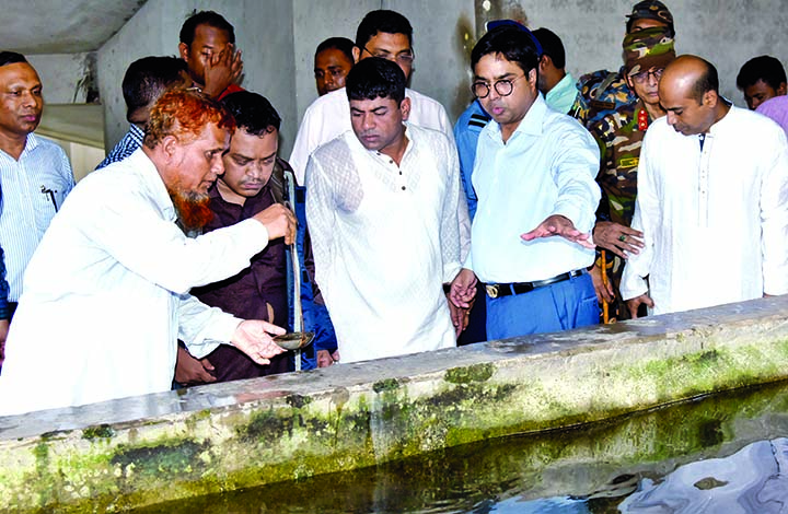 DSCC Mayor Sayeed Khokon inspecting work for destroying larvae of aedes mosquitoes with a view to resisting dengue and chikunguniya diseases. The snap was taken from the city's Shantinagar area on Tuesday