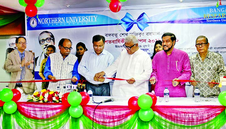 Information Minister Dr Hasan Mahmud along with other distinguished persons inaugurating a ceremony organised on Sunday on the occasion of Bangabandhu's birth centenary by Northern University Bangladesh on its premises.